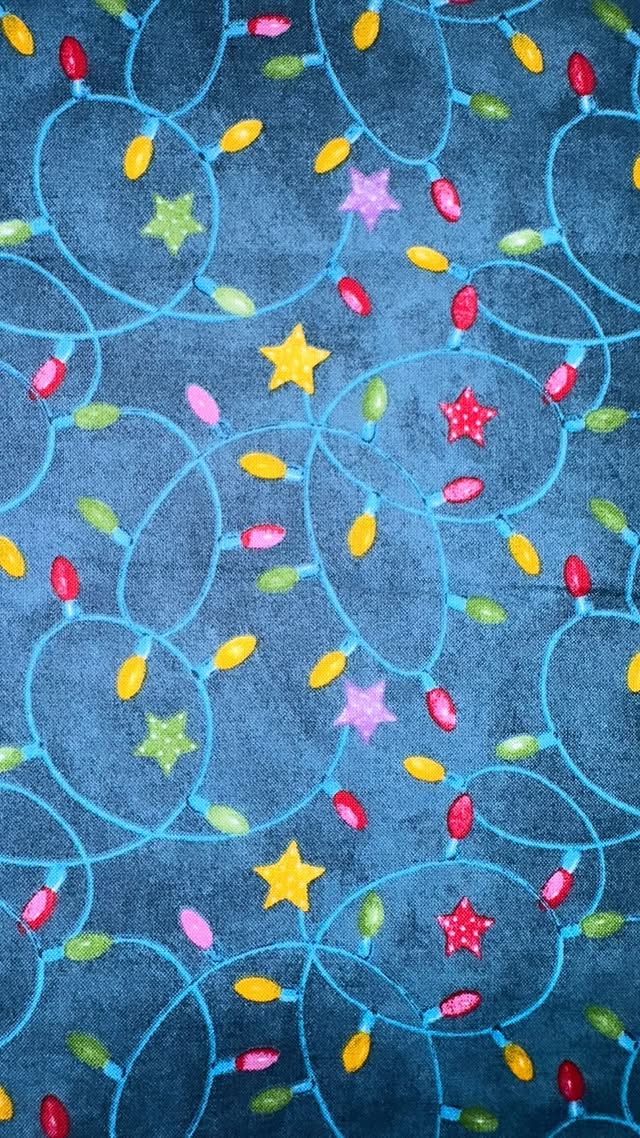 Christmas Lights and Stars on Blue
